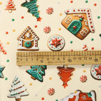Tela estampada de pan de jengibre navideño y festivo – 100% poliéster, 150 cm de ancho